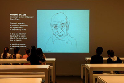 Harry drawing projection at Tate Modern