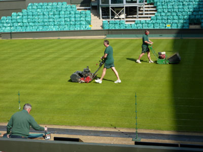 Groundsman mowing
