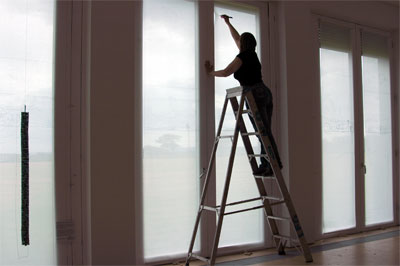 Sally undertaking a drawing installation at Faith House Gallery, Holton Lee,