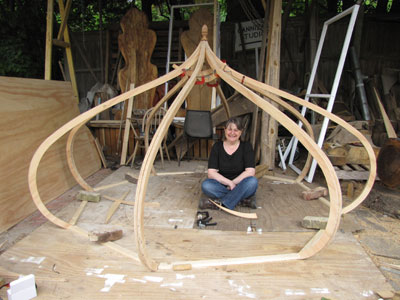Sally sitting inside Brighton Pavilion drawing tent.