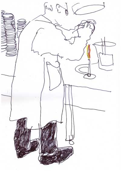 Man-in-lab-with-bunsen-burner