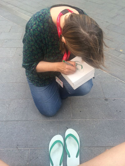 Sally drawing flip flops