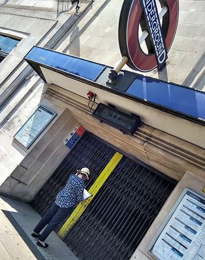 Sally drawing Closed Stations Clapham Sout, Photos by Jon Olney